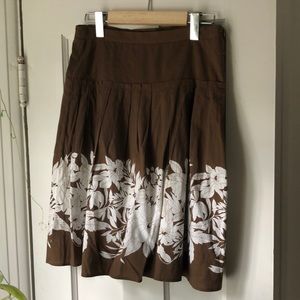 Bcbgmaxazria brown skirt with white flowers size 0
